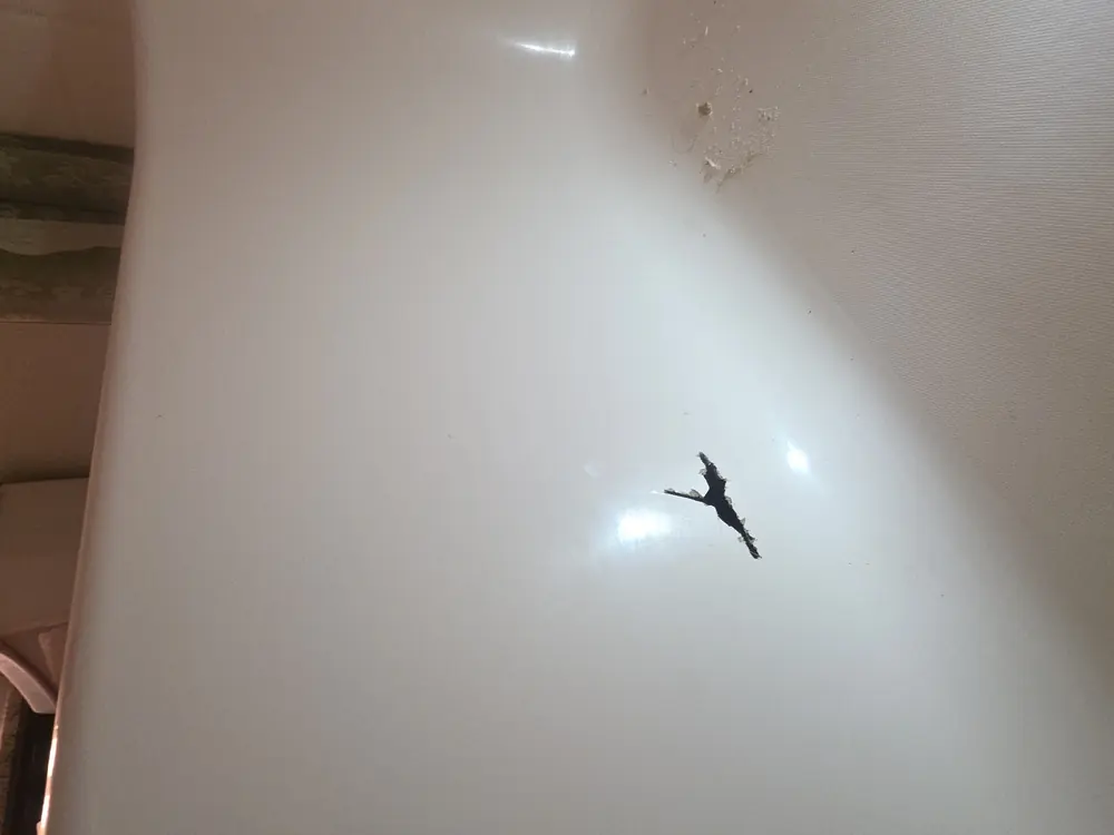 Damaged surface before repair, unit 223